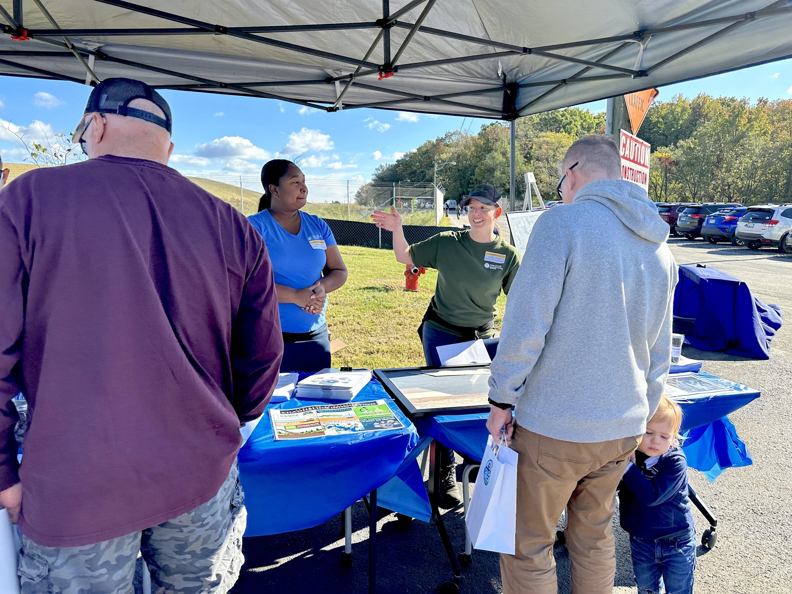 Community table with people providing information
