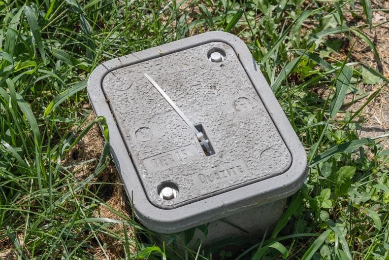 noise monitor on telephone pole and vibration monitor on grass