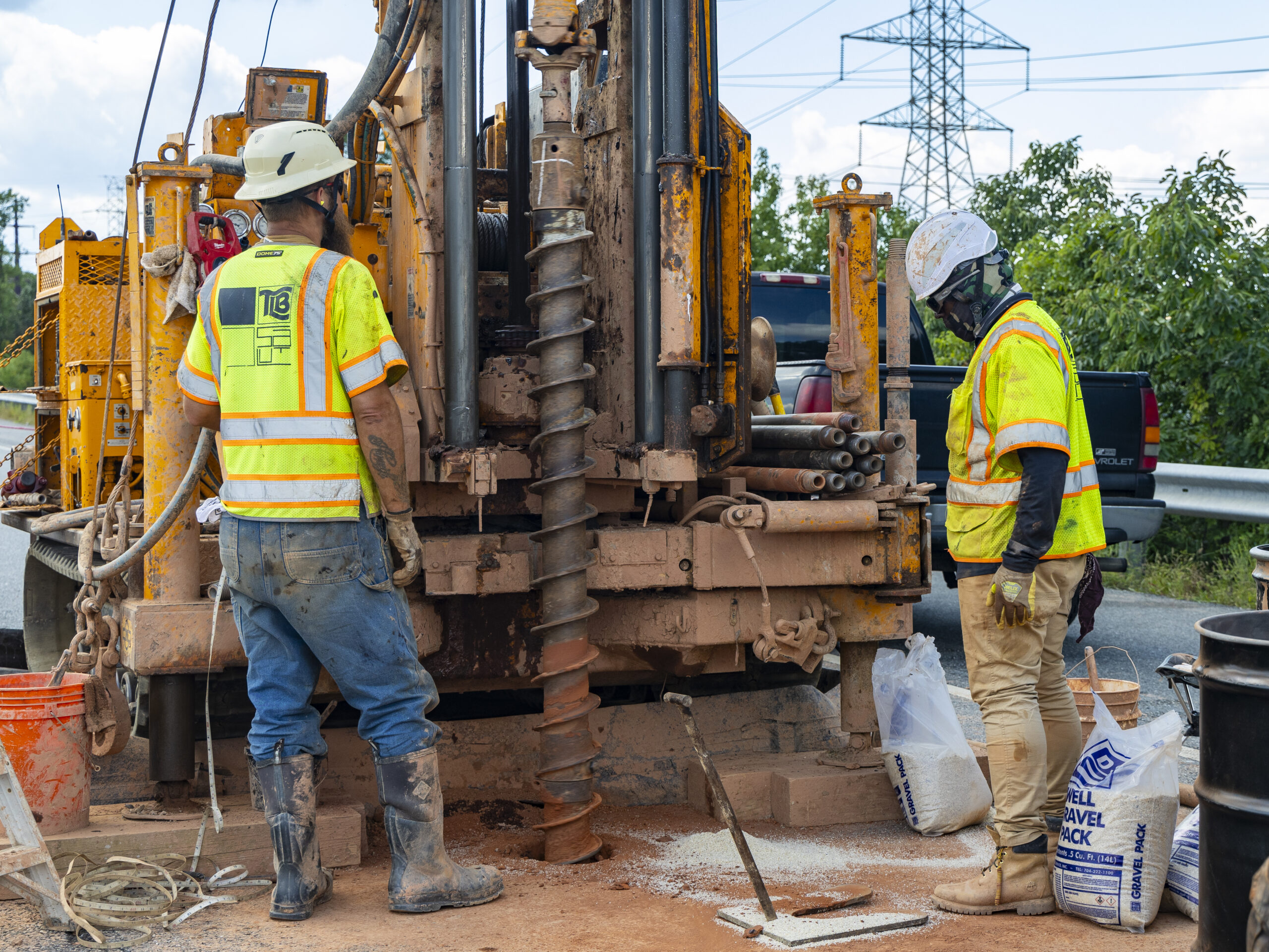Crews conducting tests on soil.